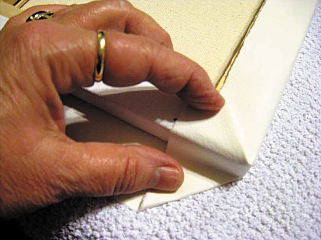 making-the-fold2-corner-stretching-watercolour-paper-over-a-canvas-aotearoa-artist